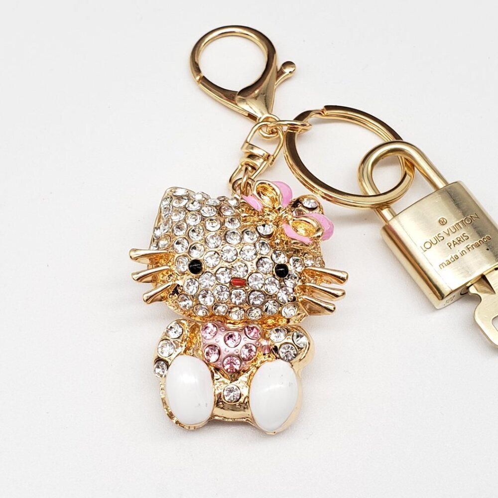 Louis Vuitton Gold Lock 🔒 Authentic LV Key + Unbranded Hello Kitty Bag Charm - Picture 5 of 8